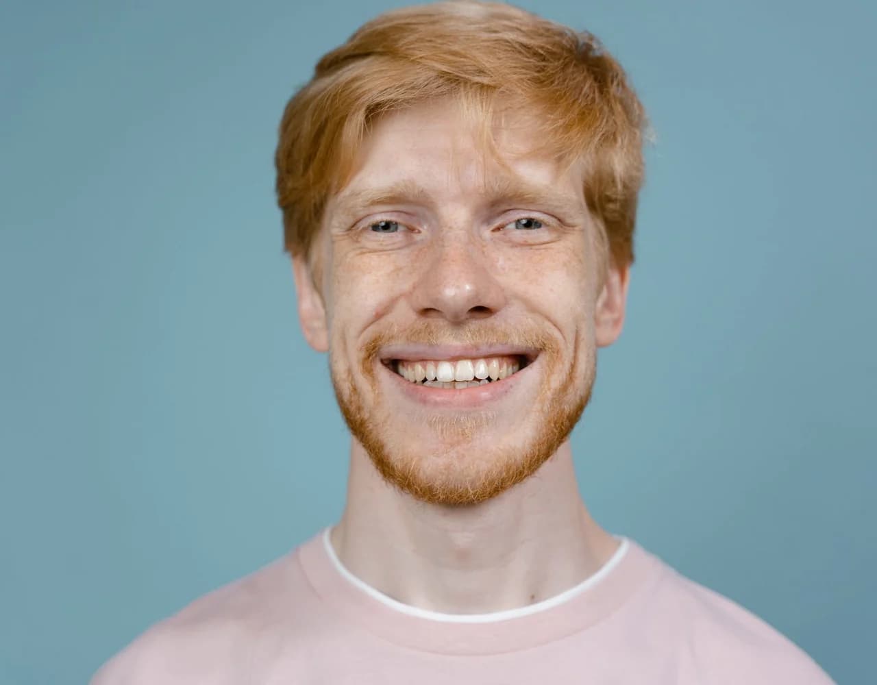 A person smiling thoughtfully